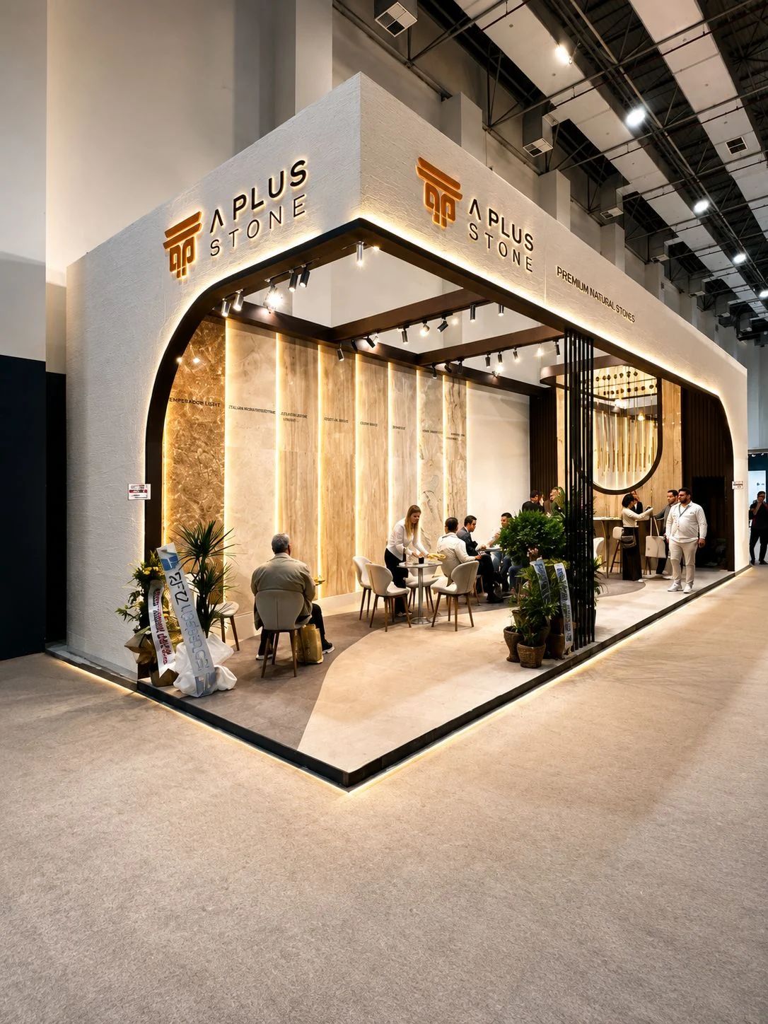 Front corner view of the Aplus exhibition stand at Marble İzmir 2026